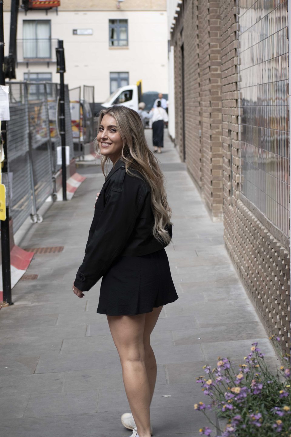 Client photographed on a private street photography walk through central London, shot in available light by Aby Abhyankar — frame 11 of 79.