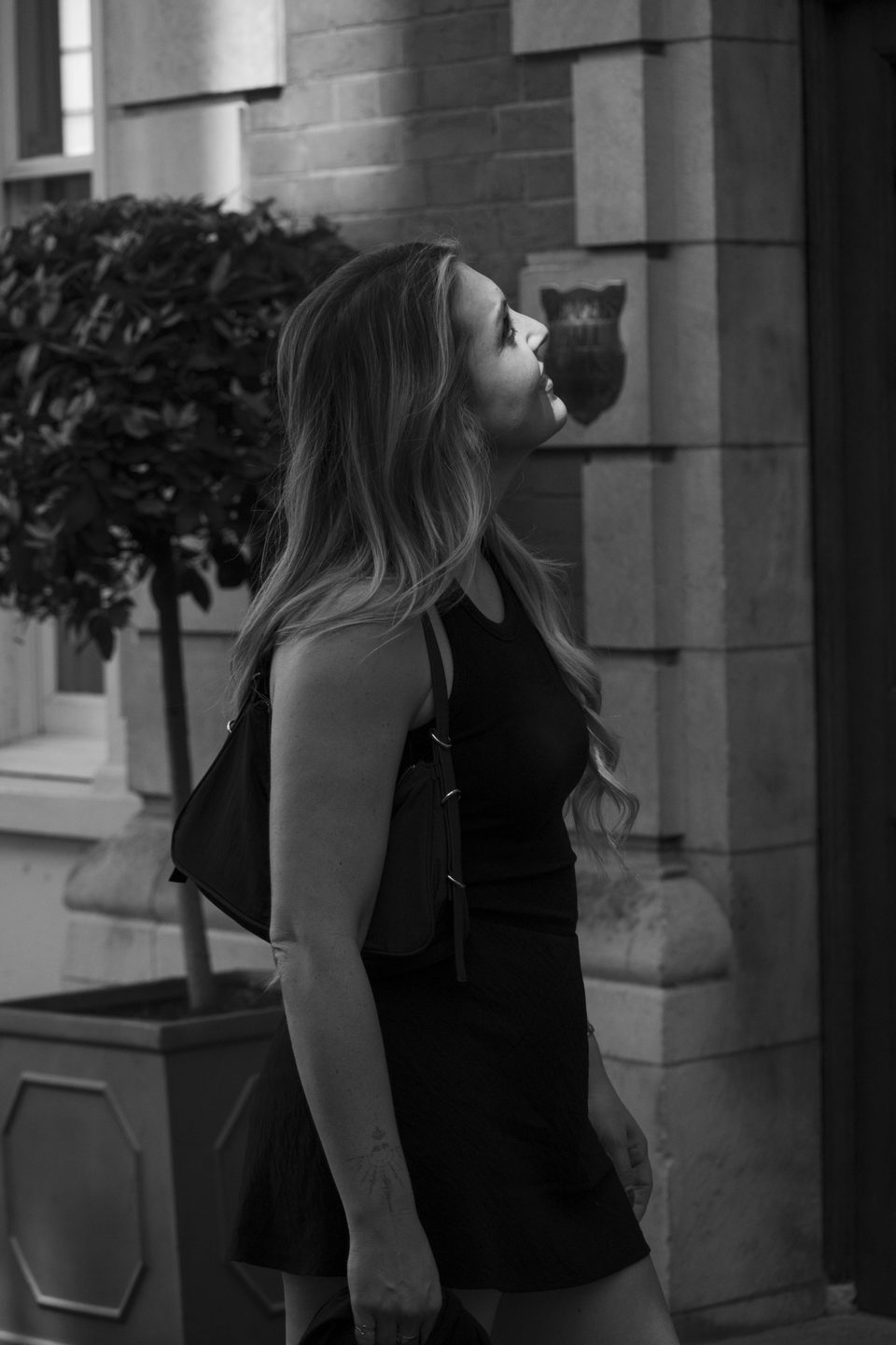 Client photographed on a private street photography walk through central London, shot in available light by Aby Abhyankar — frame 17 of 79.