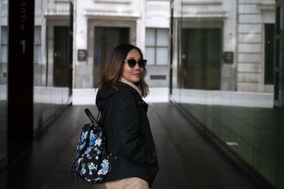 Client photographed on a private street photography walk through central London, shot in available light by Aby Abhyankar — frame 40 of 79.