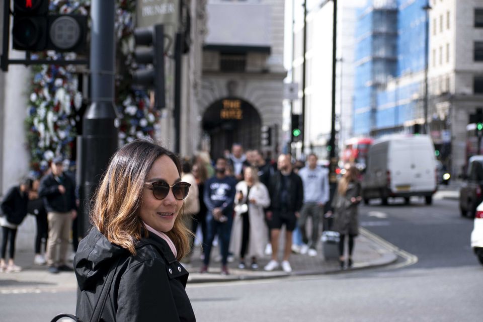 Client photographed on a private street photography walk through central London, shot in available light by Aby Abhyankar — frame 41 of 79.