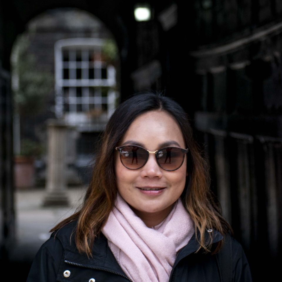 Client photographed on a private street photography walk through central London, shot in available light by Aby Abhyankar — frame 42 of 79.