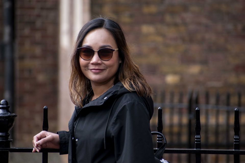 Client photographed on a private street photography walk through central London, shot in available light by Aby Abhyankar — frame 43 of 79.